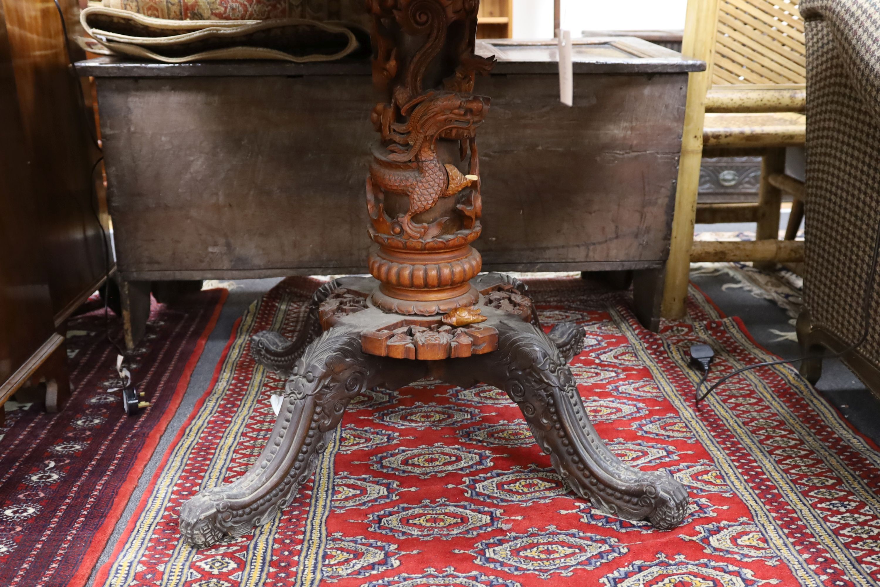 A Chinese carved hardwood circular inlaid centre table, diameter 122cm, height 87cm